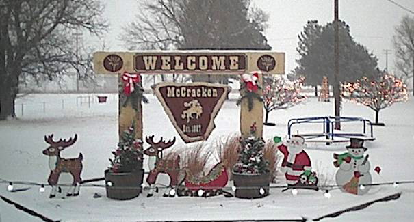 The welcome sign and the Christmas decoration at the City Park