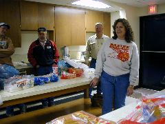 The Community Club provides the bags of treats from Santa.  Those in this picture include Heath North, Les Rogers, John Irvin and Sheryl Rogers