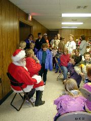 This is a group waiting in line to talk to Santa
