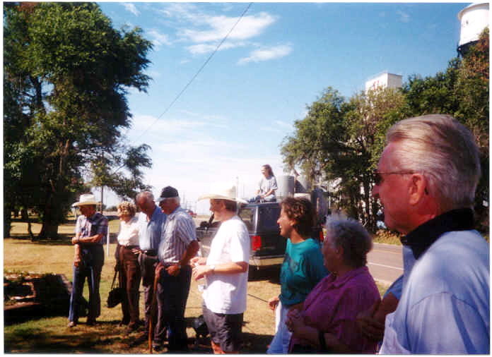 Left to right, Adrian Doerr, Doris Doerr, Maynard Swisher, G. T. Barnes, Tim Rues, Susan Keith, Arlene Rues, Ben Anderson.  Perched on the top of the SUV is our favorit reporter, photographer, Stacie Sandall, Rush County News.