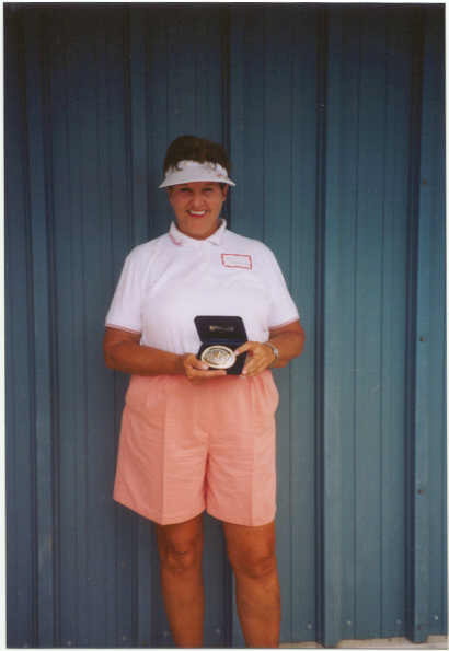 Jan won a Rodeo Buckle for being closest to the hole.