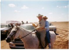 Jack Wilson - Shirley Higgins. This is on the trail ride on July 10 -- 100 degrees plus.  The beer was for "my horses".