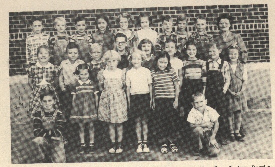 Grade School 1951-1952 1st & 2nd Grades 3rd row:  Roy Jones, Dwight Eisenhour, Arlyn North, Carol Ann Davis, Linda Gaschler, Judy Gaschler, Wendell Conrad, Harold Dixon, Norman Anderson, Mrs. Katharen Rodeman, teacher.

 

2nd row: Vicky Irvin, Dennis Walker, Kyle Rodeman, Larry McCormick, Tena Vogle, Michael Cain, Pauletta Schuckman, Paul Ohlemeier, Glenda Herdman.

 

1st row:  Lanny Pauley, Norma Jean Schuckman, Marilyn Higgins, Sheryl Rein, Claudine Rein, David Norlin.