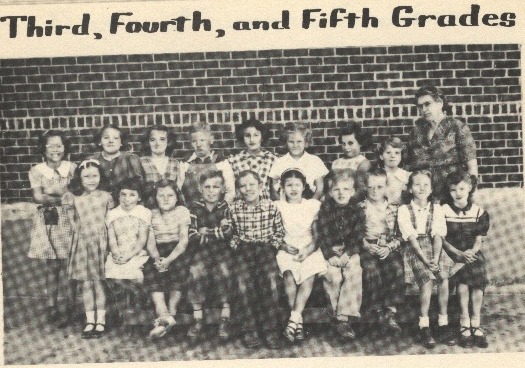 Grade School 1951-1952 3rd, 4th, & 5th Grades 2nd row:  Jane Gaschler, Marian Barnes, Sarah Beth Cain, Kenneth Grumbein, Vickie Zeller, Elaine Eisenhour, Aletha Pfannenstiel, Carolyn Higgins, Mrs. Barnes, teacher.

1st row:  Lavona Lou Peters, Shirley Pfannenstiel, Phyllis Gerritzen, Terry Wierman, Roy Pfaff, Shirley Stremel, Leroy Herdman, Bennett Lee Grate, Carol Kay Huxol, Ellen Bible.  3rd, 4th and 5th graders, McCracken Grade School.