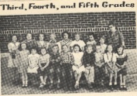 Grade School 1951-1952 3rd, 4th, & 5th Grades 2nd row: Jane Gaschler, Marian Barnes, Sarah Beth Cain, Kenneth Grumbein, Vickie Zeller, Elaine Eisenhour, Aletha Pfannenstiel, Carolyn Higgins, Mrs. Barnes, teacher. 1st row: Lavona Lou Peters, Shirley Pfannenstiel, Phyllis Gerritzen, Terry Wierman, Roy Pfaff, Shirley Stremel, Leroy Herdman, Bennett Lee Grate, Carol Kay Huxol, Ellen Bible. 3rd, 4th and 5th graders, McCracken Grade School.