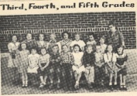 Grade School 1951-1952 3rd, 4th, & 5th Grades 2nd row:  Jane Gaschler, Marian Barnes, Sarah Beth Cain, Kenneth Grumbein, Vickie Zeller, Elaine Eisenhour, Aletha Pfannenstiel, Carolyn Higgins, Mrs. Barnes, teacher. 1st row:  Lavona Lou Peters, Shirley Pfannenstiel, Phyllis Gerritzen, Terry Wierman, Roy Pfaff, Shirley Stremel, Leroy Herdman, Bennett Lee Grate, Carol Kay Huxol, Ellen Bible.  3rd, 4th and 5th graders, McCracken Grade School.