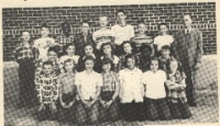 Grade School 1951-1952 Grades 6th, 7th, & 8th 3rd row: Roy Conrad, Bobby Higgins, Augustine Thompson, Gary Moses, John Hanson, Linus Schlitter, Larry Eisenhour, Bobby Cain, Mr. Alvin Maddy, teacher. 2nd row: Gerald Crotinger, Ona Ruth Dixon, Diana Walker, Jodene Dawson, Pat Ryan, Patricia Thompson, Clara Mae Grumbein. 1st row: Eddie Schuckman, Carol Faye Bible, Verna Mae Dixon, Marjean Jones, Hazel Pfaff, Mary Ann Graf, Reva Rodeman.