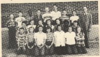 Grade School 1951-1952 Grades 6th, 7th, & 8th 3rd row:  Roy Conrad, Bobby Higgins, Augustine Thompson, Gary Moses, John Hanson, Linus Schlitter, Larry Eisenhour, Bobby Cain, Mr. Alvin Maddy, teacher.   2nd row:  Gerald Crotinger, Ona Ruth Dixon, Diana Walker, Jodene Dawson, Pat Ryan, Patricia Thompson, Clara Mae Grumbein.   1st row:  Eddie Schuckman, Carol Faye Bible, Verna Mae Dixon, Marjean Jones, Hazel Pfaff, Mary Ann Graf, Reva Rodeman.