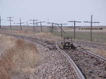 These pictures are just west of Ransom. It will end just west of McCracken about two miles. The street intersection is the main street crossing at Ransom. A lot of people came to settle this country on this very track.