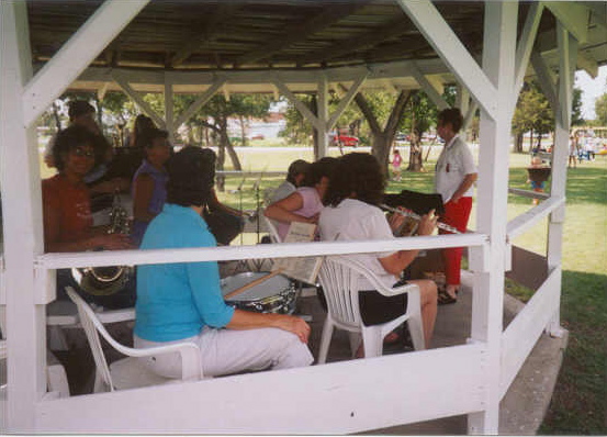 Arlene Gilbert prepares the alumni band at the gazebo at City Park

 

Art work done by Bob Foster and Paulette Harp used in skit at the alumni meeting.