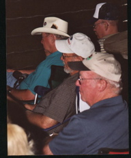 Bill Lovitt, Curly Juvenal, Babe Gilbert, LeRoy Gilbert watching rodeo events