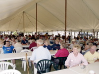 A tent full of alumni